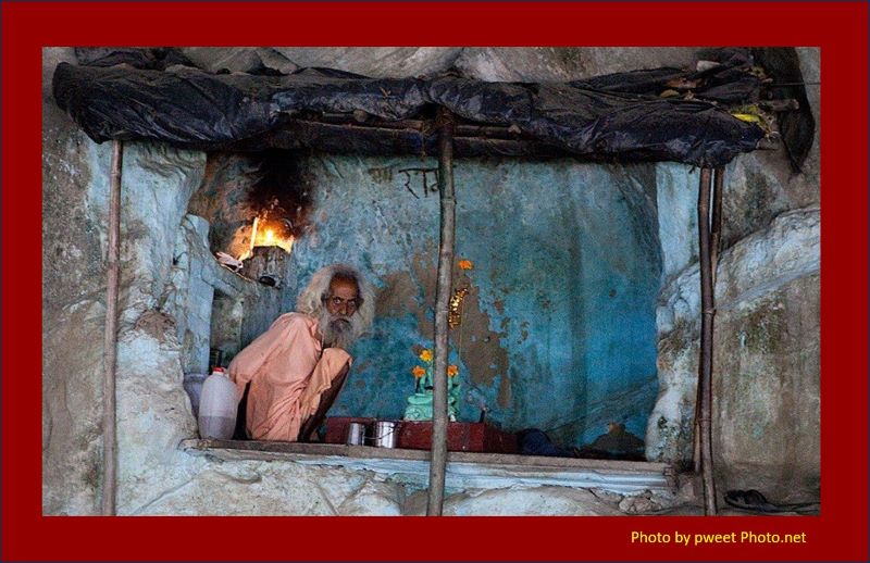 Lost Knowledge Mashup A wild-eyed gray-bearded sadhu in a cave.