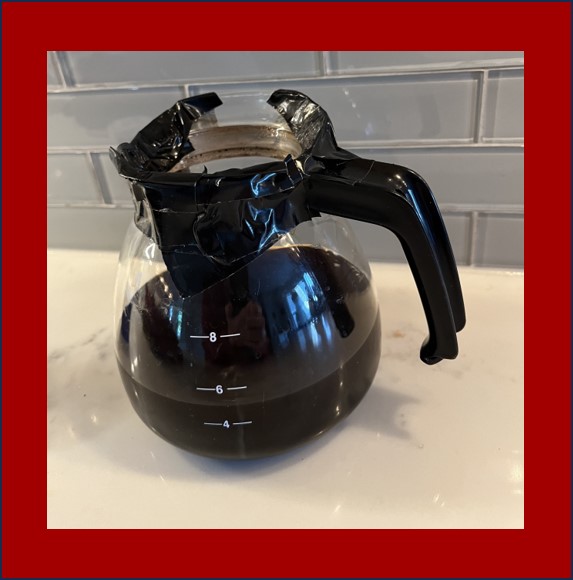 Broken Melita coffee pot with top duct taped