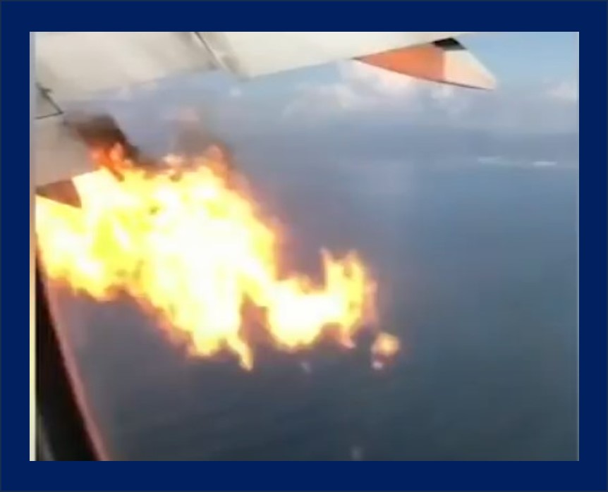 Balousov Zhabatinsky Looking out the plane window, I saw the plane engine on fire.