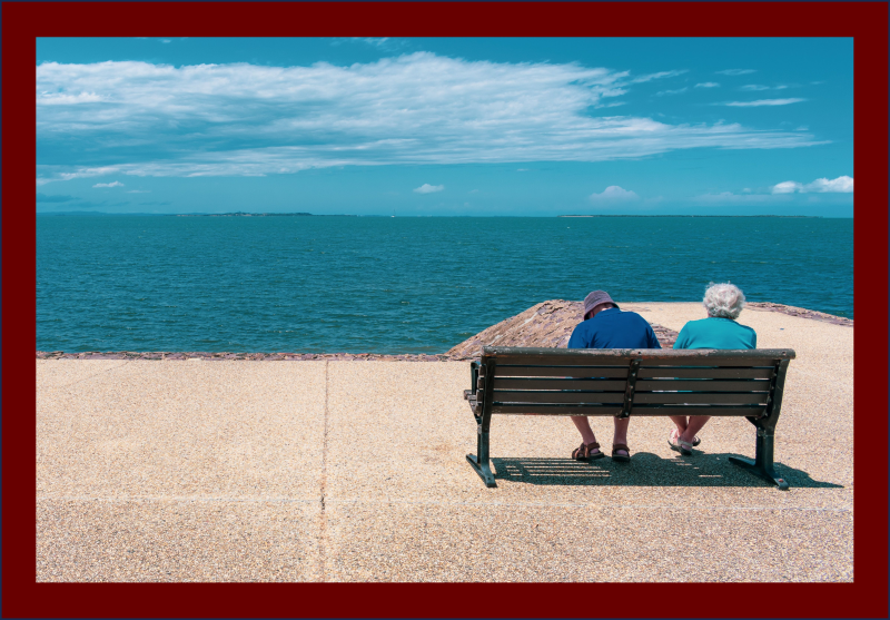 Lost Knowledge Mashup Old couple on a bench looking at the sea